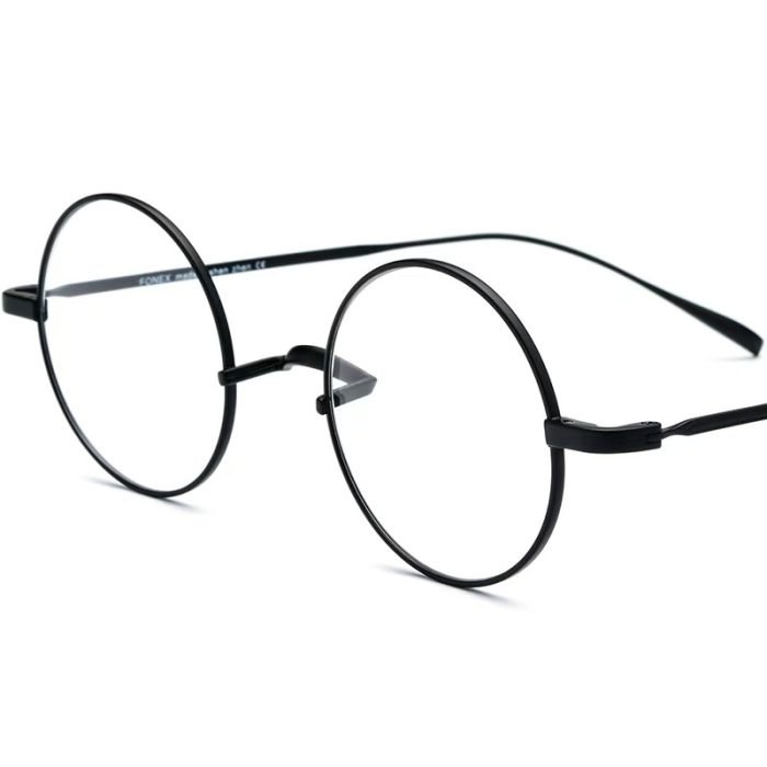Unisex black circular titanium frame, designed in a minimalist style, customizable prescription lenses suitable for any daily life