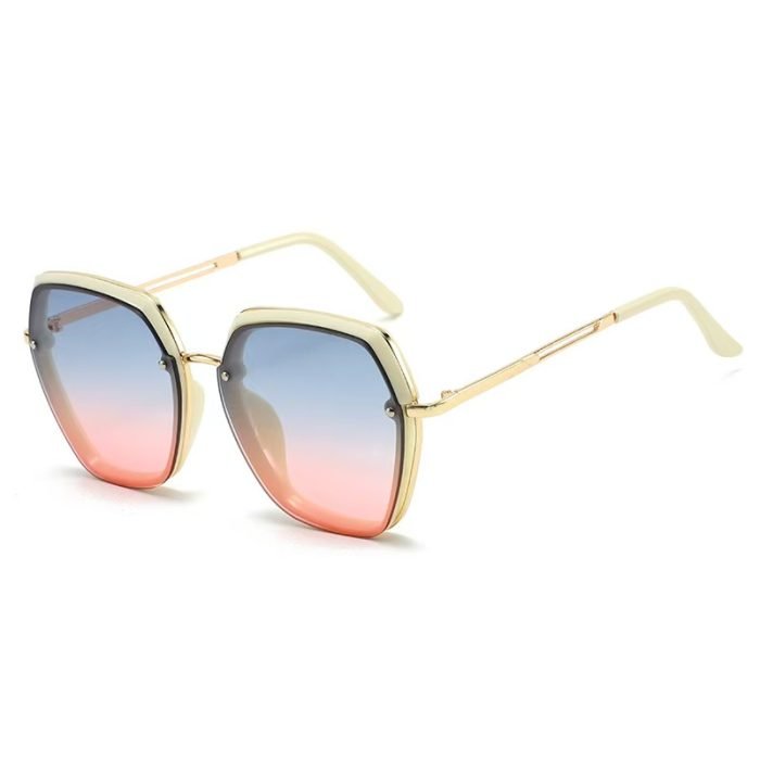 Women's geometric metal frame sunglasses - lightweight UV400 protection. Perfect for street style photography and urban fashion blogging in city environments.