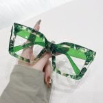 Clear frame cat eye sunglasses with prescription blue light filtering - UV400 protection. TikTok viral 2024 trend for fashion-forward women's casual wear.