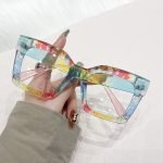 Prescription cat eye sunglasses with blue light blocking - clear frames with UV protection. Perfect for driving, shopping, and daily activities with style. TR90