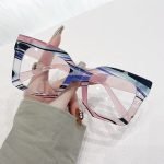 Women's clear cat eye sunglasses - customizable prescription lenses with blue light and UV protection. Stylish casual wear for coffee dates and outings.