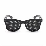 Student vision training glasses - black pinhole design requires just 5 minutes daily. Helps maintain focus during homework and reduces eye strain naturally.