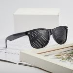 Drug-free vision improvement for teens - black pinhole glasses require just 5 minutes daily. Multi-hole training alternative to corrective lenses.