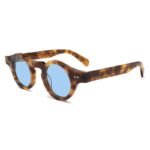 Thick-frame oval sunglasses featuring premium acetate construction and anti-glare polarized lenses for sun protection.