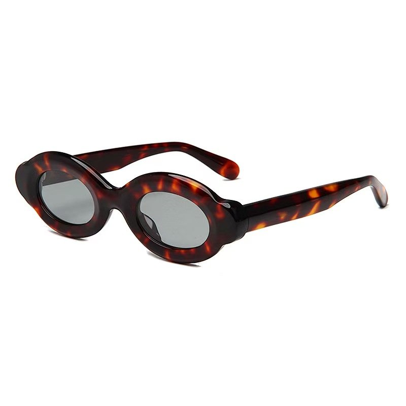 微信图片_20250917204808_941_11 Light-responsive oval acetate sunglasses featuring polarized lenses and UV protection, perfect for indoor-outdoor transition.