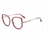 Computer glasses for women with a minimalist design. This polygon frame blends acetate & metal, offering blue light protection & prescription compatibility.