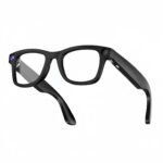 Person using smart glasses for real-time language translation during travel or business meetings with clear frame design.